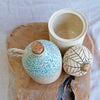 Ceramic jars with leaf pattern and coastal design