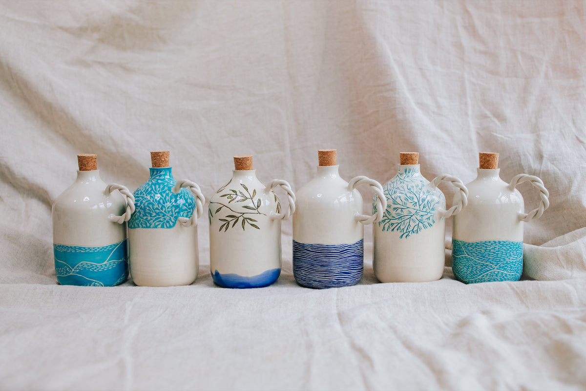 Six handmade ceramic olive oil bottles with sgraffito sea, pine and olive motifs – Pine Pottery, Split